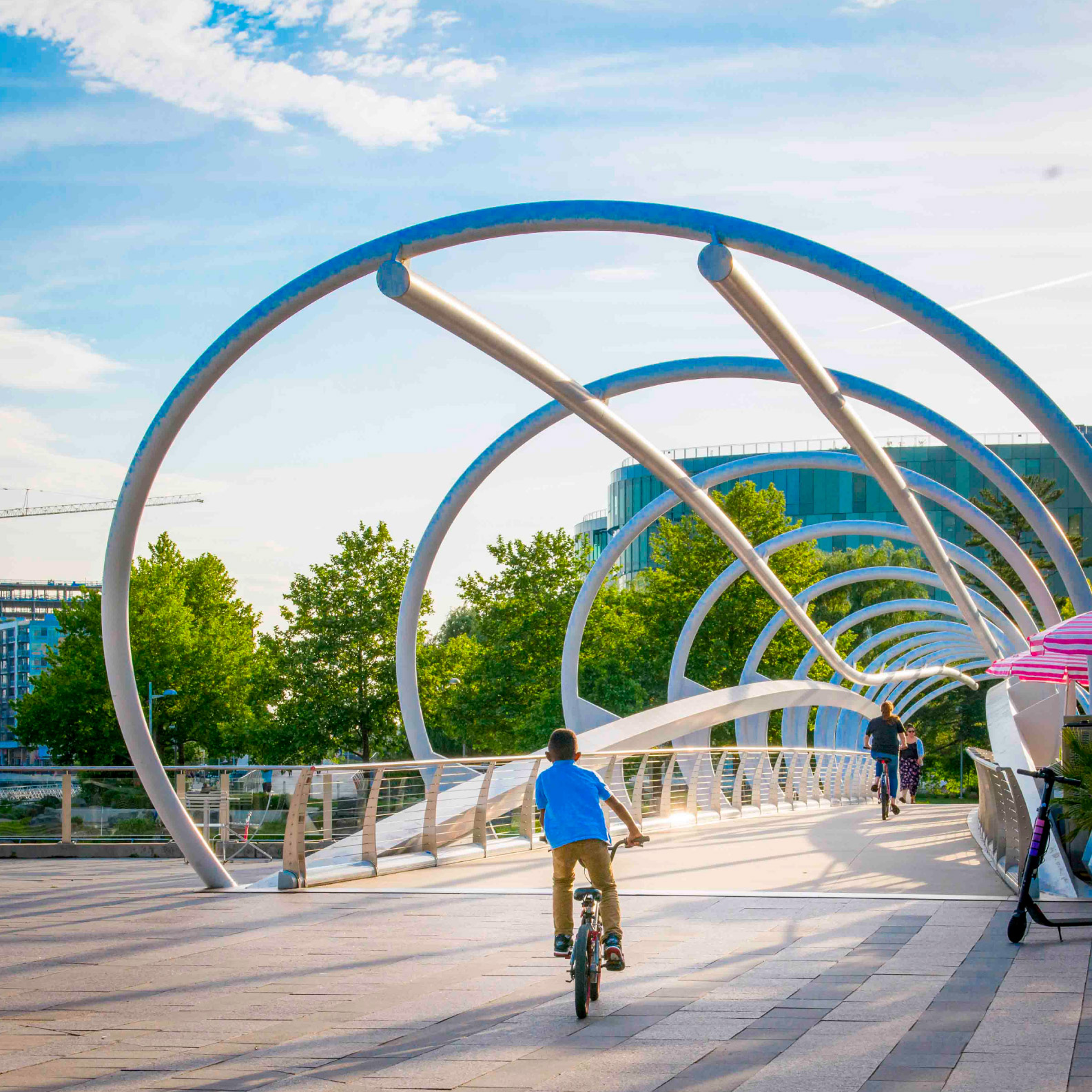 Riding a bike across a bridge